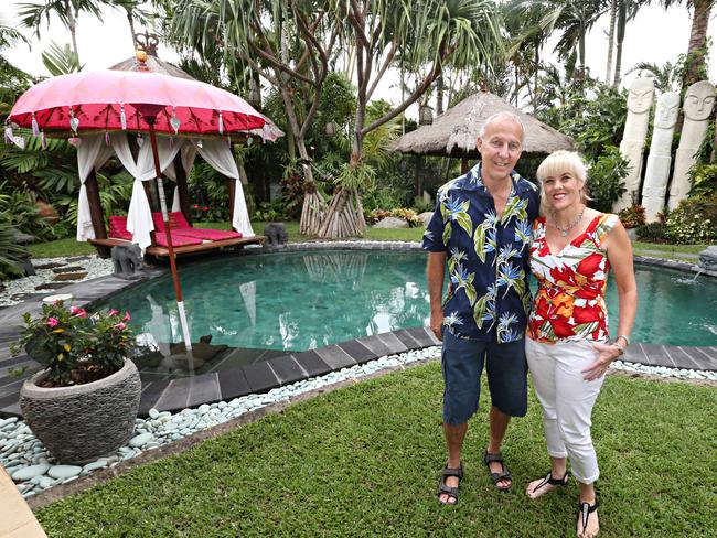 Rene and Carolyn Hundscheidt in their Balinese-style garden in Sunnybank Hill. Pic Annette Dew