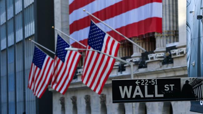 Wall Street stocks jumped past 30,000 for the first time, the latest milestone in a postelection rally.