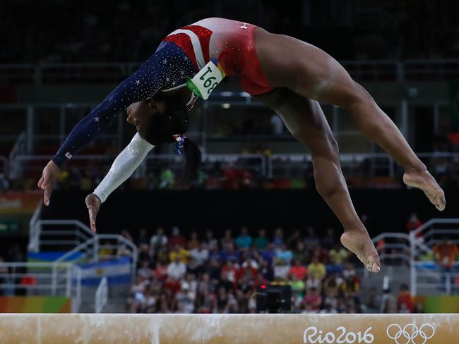 Simone Biles literally soars on floor, bar, beam, and vault.