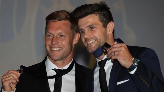 Sam Mitchell and Trent Cotchin proudly wear their 2012 Brownlow Medals. Picture: Alex Coppel