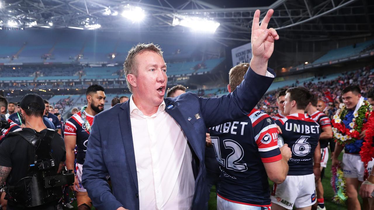 SYDNEY, AUSTRALIA - OCTOBER 06: Roosters coach Trent Robinson celebrates victory with fans after the 2019 NRL Grand Final match between the Canberra Raiders and the Sydney Roosters at ANZ Stadium on October 06, 2019 in Sydney, Australia. (Photo by Matt King/Getty Images)