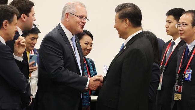 Australian Prime Minister Scott Morrison greets Chinese President Xi Jinping on the sidelines of the G20 summit in Osaka, Japan, in June. Picture: Adam Taylor/PMO