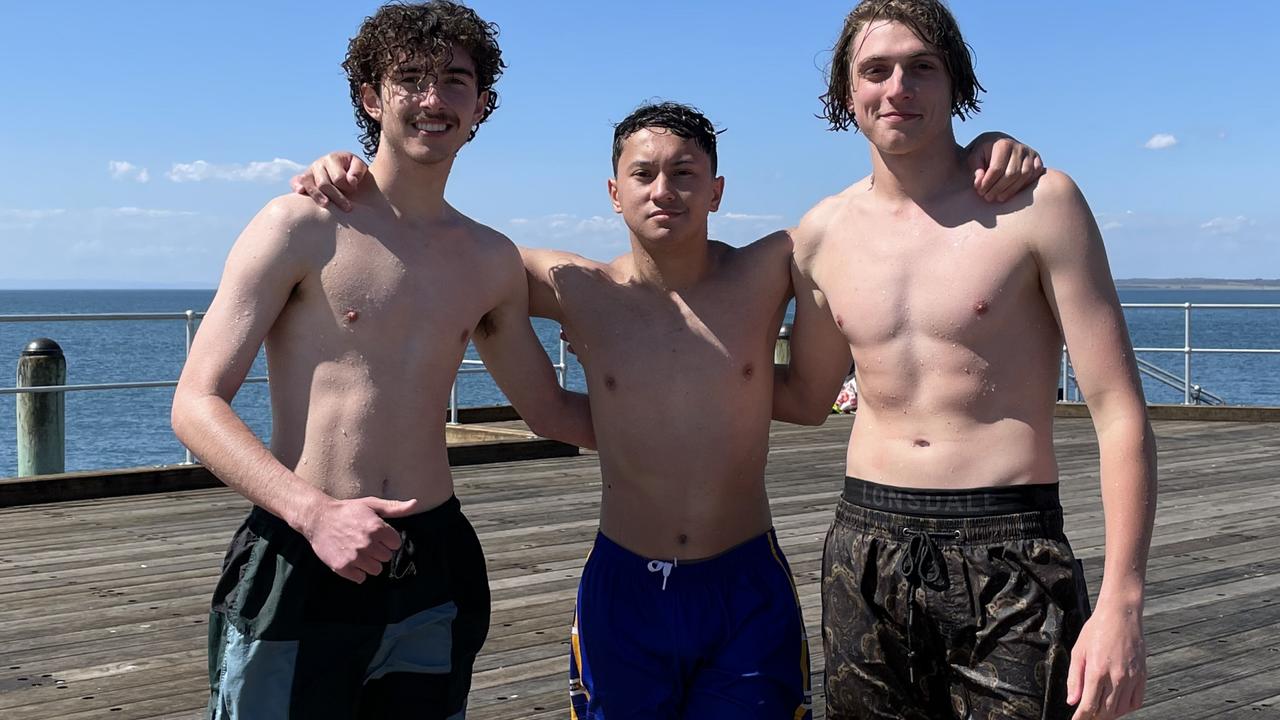 ​School leavers make the most of the great weather on the Cowes foreshore. Photo: Alice Barker