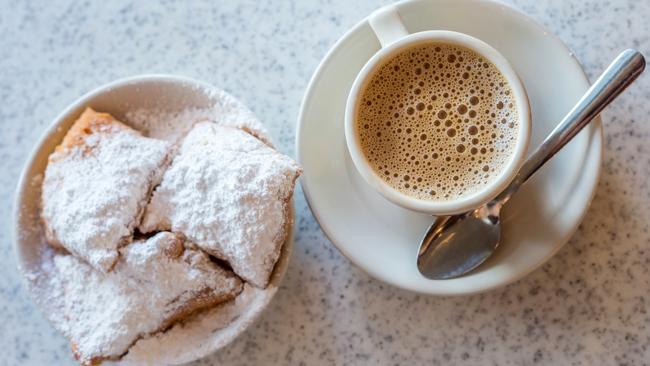 Beignets (French style donuts) topped with sugar.