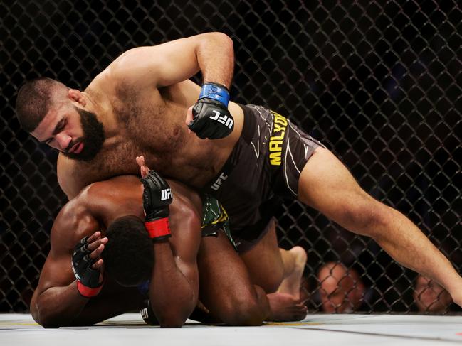 Jacob Malkoun grapples with AJ Dobson in his most recent win at UFC 271. Picture: Carmen Mandato/Getty Images