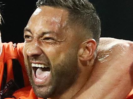 Benji Marshall of the Tigers celebrates with teammates after scoring a try during the Round 24 NRL match between the St George Illawarra Dragons and the Wests Tigers at the SCG in Sydney, Sunday, September 1, 2019.  (AAP Image/Brendon Thorne) NO ARCHIVING, EDITORIAL USE ONLY