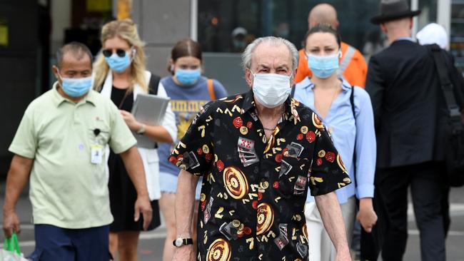 Passengers wear face masks at Central Station in Sydney. Picture: Joel Carrett