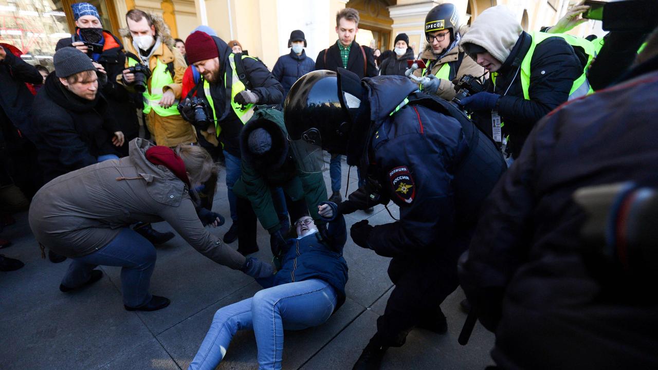 Police officers detain a demonstrator during a protest against Russia's invasion of Ukraine in central Saint Petersburg. Picture: AFP