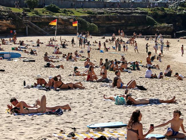 People sunbaking at Bronte Beach. Picture: NCA NewsWire / Nicholas Eagar