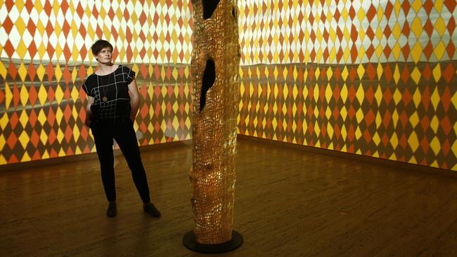 Biennale chief executive Barbara Moore with The Mulka Project’s video artwork Watami Manikay (Song of the Winds). Picture: John Appleyard