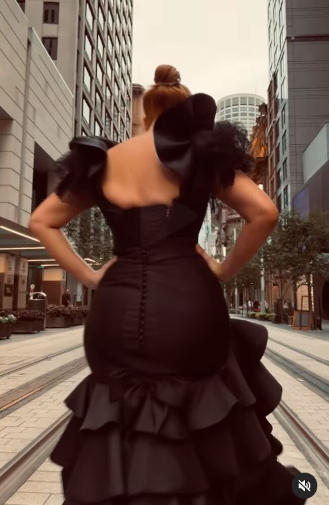 She used the Sydney CBD streets as her runway, strutting up and down as she showed off the ‘stunning’ dress. Picture: Instagram/julesrobinson82