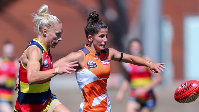 Adelaide’s Erin Phillips and GWS’ Jessica Dal Pos in action on the weekend. Picture: Matt Turner/AFL Photos via Getty Images