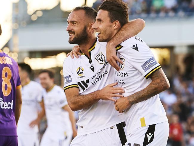 SYDNEY, AUSTRALIA - APRIL 02: Matthew Derbyshire of Macarthur FC celebrates scoring a goal with team mates during the A-League match between Macarthur FC and Perth Glory at Campbelltown Stadium, on April 02, 2021, in Sydney, Australia. (Photo by Brett Hemmings/Getty Images)