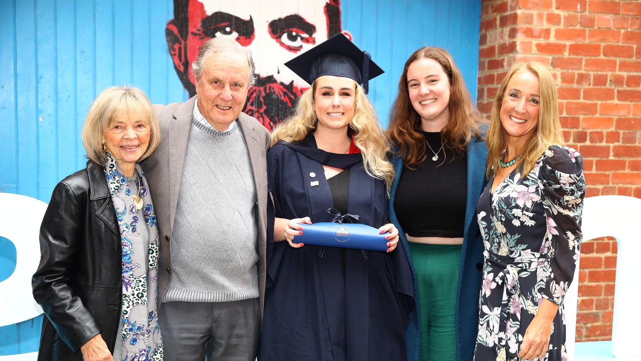 Deakin graduate Sophie Weaver with grandparents Bronwen and Darcy Seller, sister Abby Weaver and mum Laurel Weaver. Picture: Alison Wynd