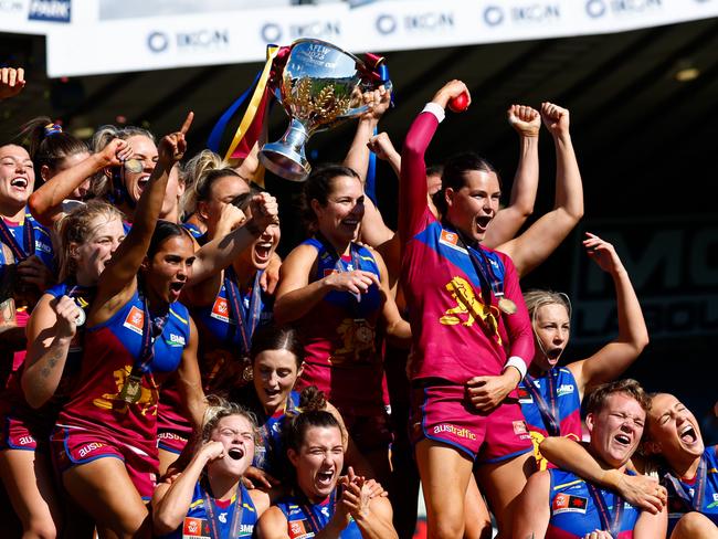 MELBOURNE, AUSTRALIA - DECEMBER 03: The Lions celebrate during the 2023 AFLW Grand Final match between The North Melbourne Tasmanian Kangaroos and The Brisbane Lions at IKON Park on December 03, 2023 in Melbourne, Australia. (Photo by Dylan Burns/AFL Photos via Getty Images)