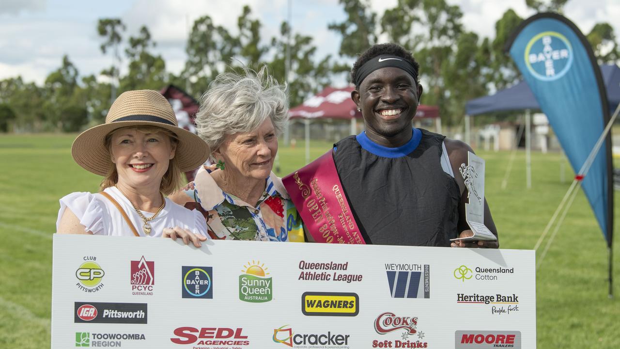 (From left) Lisa McDonald, Joan McDonald and Anas Abu Ganaba winner of the John “Cracker” McDonald 300 metres open. The Arthur Postle Gift at Pittsworth. Saturday 18th January, 2025. Picture: Nev Madsen.