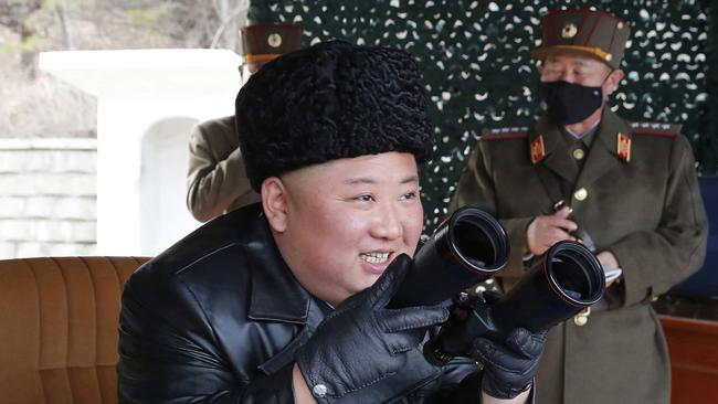 IKim Jong-un observes the missile tests on Monday. Picture: KCNA via AP