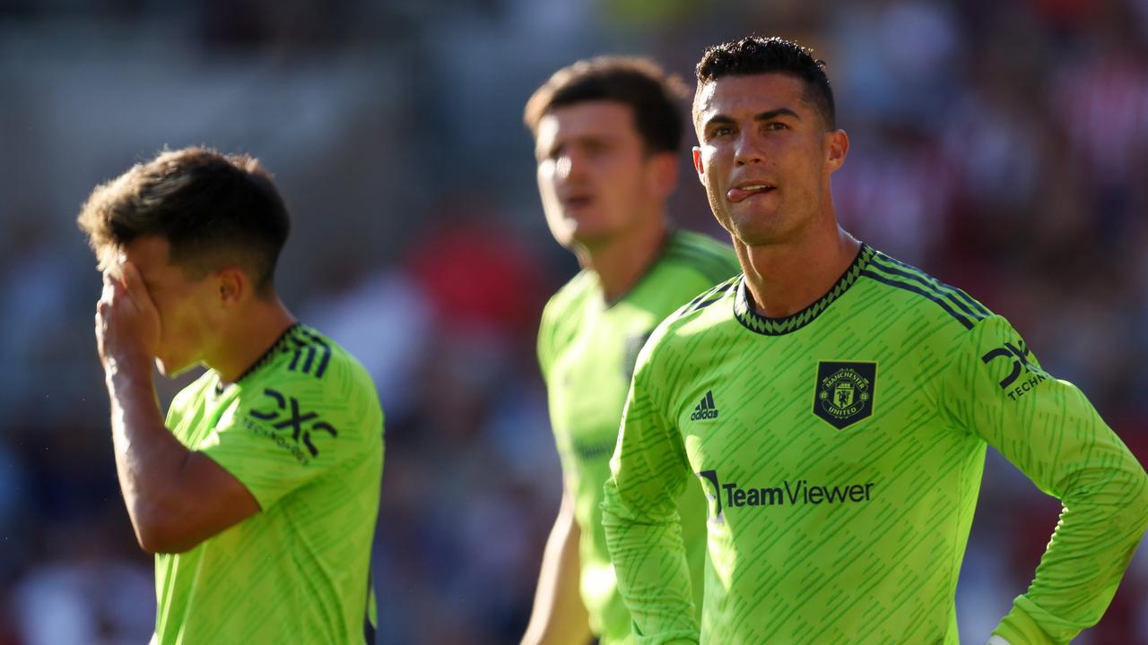 BRENTFORD, ENGLAND – AUGUST 13: Cristiano Ronaldo and Lisandro Martinez of Manchester United look dejected during the Premier League match between Brentford FC and Manchester United at Brentford Community Stadium on August 13, 2022 in Brentford, England. (Photo by Catherine Ivill/Getty Images)