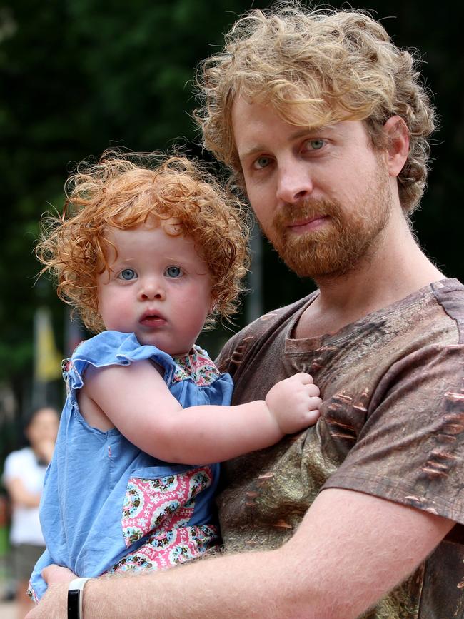 Dulwich Hill’s Dan Gooden, 35, with daughter Kala, 1.5 years, at the Demand Action: Pill Testing Save Lives protest. Picture: Damian Shaw