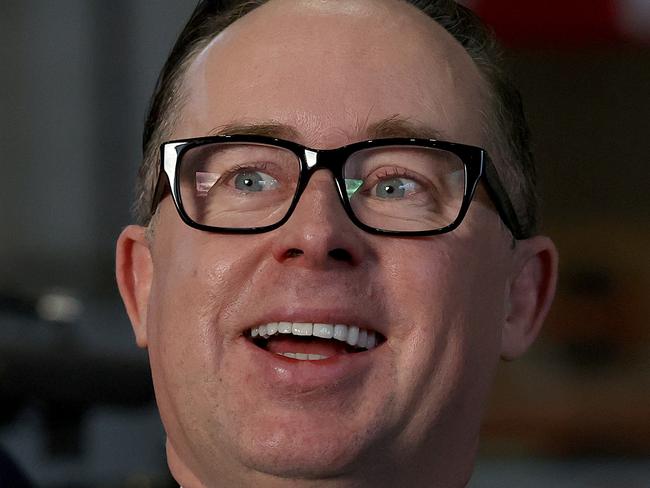 SYDNEY, AUSTRALIA - NewsWire Photos MARCH 11, 2021: Pictured Qantas CEO Alan Joyce and Virgin CEO Jayne Hrdlicka share a laugh before a press conference at Qantas Hangar 96 at Sydney Airport in Sydney NSW. Picture: NCA NewsWire / Dylan Coker