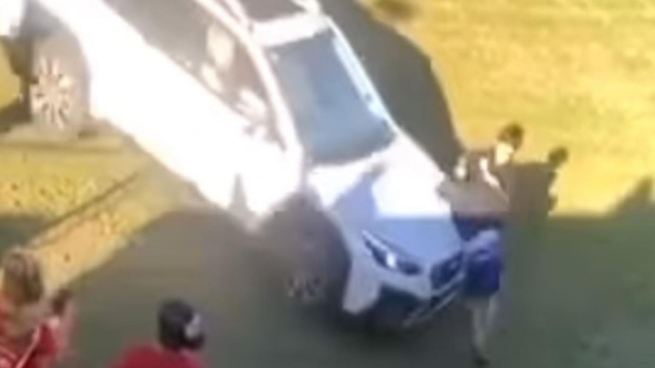 WATCH: Insane moment driver ploughs car into fighting teens