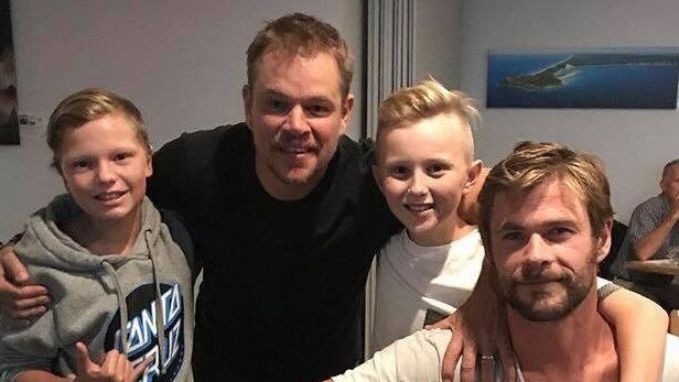 Hollywood celebrities Chris Hemsworth and Matt Damon with two young and very chuffed diners at Coffee Rocks at Rainbow on a previous visit.