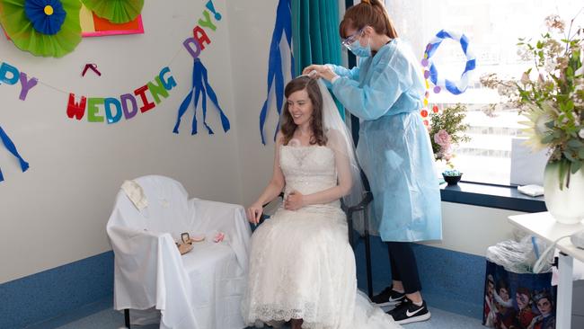 St Vincent’s nurse Laura Horgan helps Sarah with her veil. Picture: Befekir Kebede