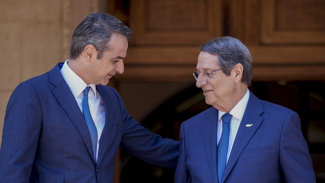 Greek Prime Minister Kyriakos Mitsotakis, left, with the President of Cyprus Nicos Anastasiades in Nocosia. Picture: AP