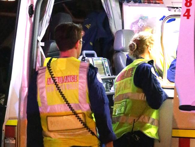 Generic Ambulance images. NSW Ambulance vehicles and Paramedics. Ambulance officers attend the scene of a crash at Qantas Drive, Mascot. Pics Bill Hearne