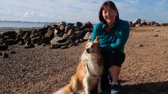 Manly West resident Trish Szilagyi and Toby welcomed the trial of a designated off-leash area at the beach.