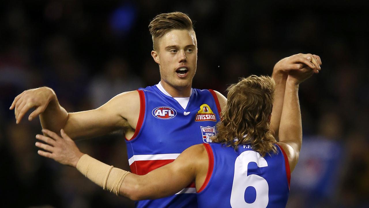 Josh Schache went down with concussion in Sunday’s loss to St Kilda. Picture: Darrian Traynor/Getty Images.