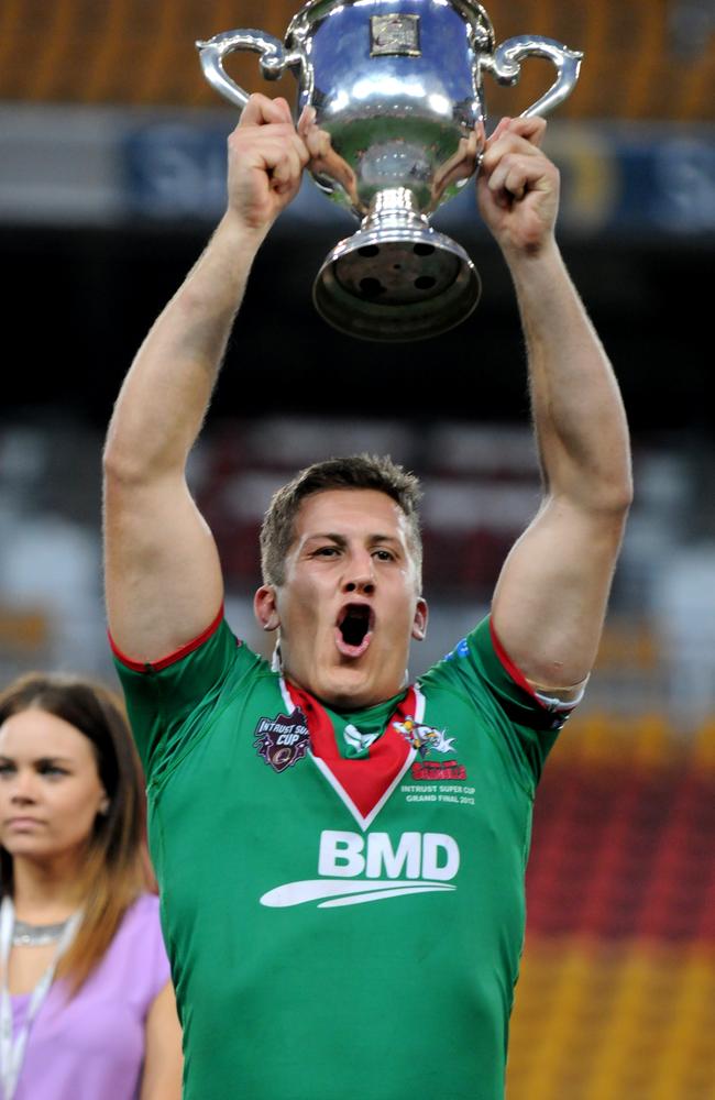 Wynnum captain Luke Dalziel-Don celebrating the 2012 grand final win over Redcliffe.