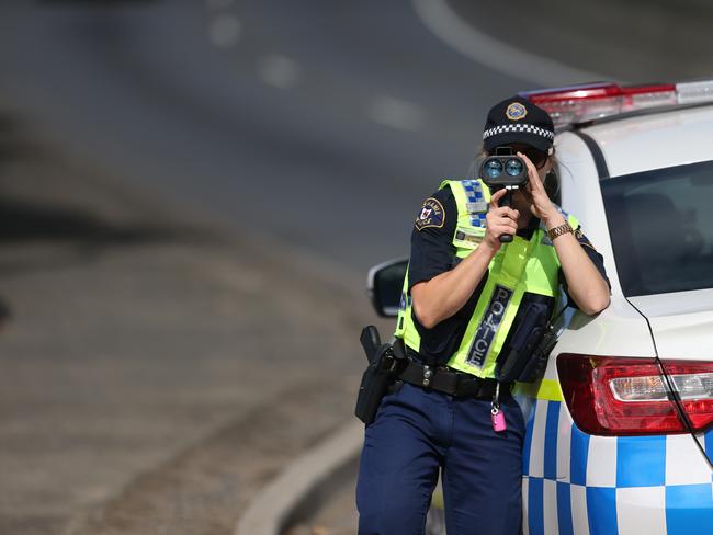 Easter Road Operation - Patrick Billings story.  Constable Brooke Johnson and Constable John Barwick of Tasmania Police checking driver's speed on the Brooker Highway at New Town.PICS: MATT THOMPSON