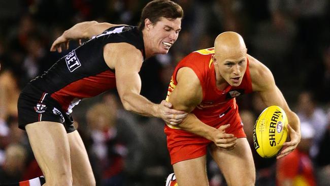 Gold Coast Suns superstar Gary Ablett, right, has hit a form slump in recent weeks and is no longer a Brownlow Medal certainty. 