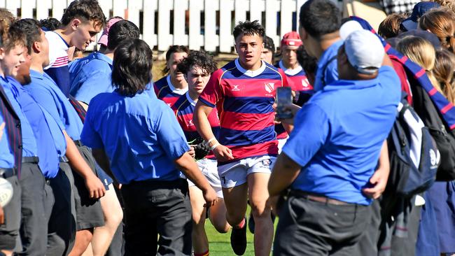 BSHS run onto the ground for the start of the game. Nudgee College v BSHS in the GPS First XV rugby. Saturday August 20, 2022. Picture, John Gass