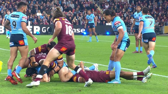 Jarome Luai stands over Selwyn Cobbo.