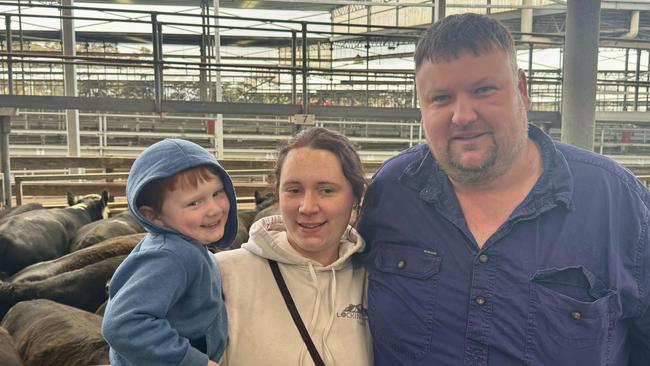 Coleraine feedlotters Grace and Tim Baulch with son Ryan (2) were buying at today's store cattle sale in Hamilton.