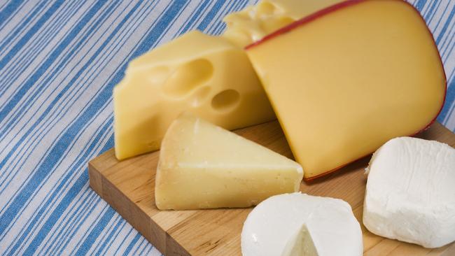 March 1: All About Cheese: generic: variety of cheeses on cutting board (source: ThinkStock).