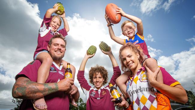 Former Queenslanders now Melburnians Dylan Barker with his wife Jen with Riley, 14, Aislin, 6, and Finn, 5. Picture: Mark Stewart