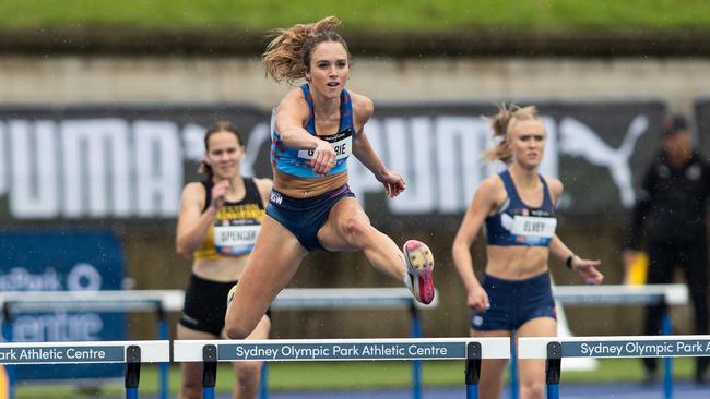 Isabella Guthrie from Mount Kuring-Gai takes gold in the U20 hurdles.