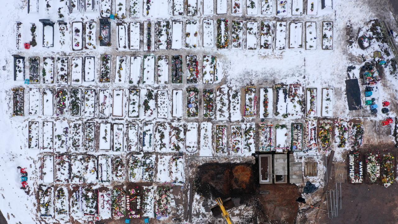 An aerial view of recent graves at Sutton New Hall Cemetery in the UK, where deaths from coronavirus have just passed 100,000. Picture: Christopher Furlong/Getty Images