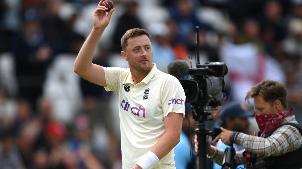 NOTTINGHAM, ENGLAND - AUGUST 06: England bowler Ollie Robinson with the ball after taking his 5th wicket of the innings during day three of the First Test Match between Enaches 50 runs gland and India at Trent Bridge on August 06, 2021 in Nottingham, England. (Photo by Stu Forster/Getty Images)
