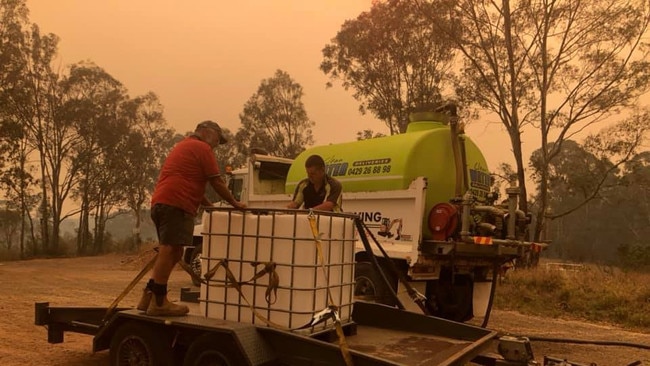 Council has two water carts set up at the top of Avoca Rd, Silverdale and at Oakdale RFS station for anyone that isn’t on town water and needs some water to help protect their property if the fire comes out of the catchment. Picture: Facebook