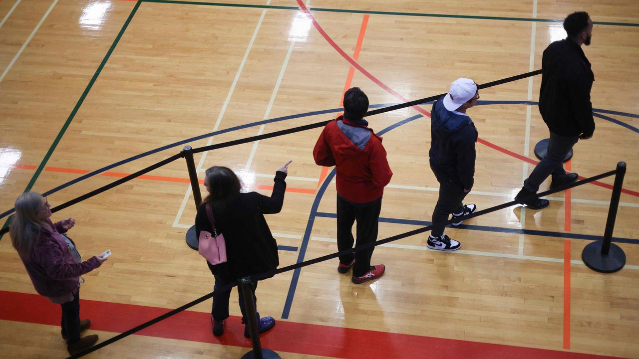 Georgia voters wait to cast their ballots in the run-off election. Picture: Win McNamee/Getty Images/AFP