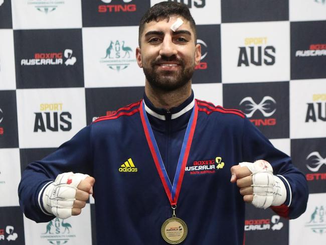 Edgardo Coumi shows off his national championships gold medal in Melbourne. Picture: Edgardo Coumi