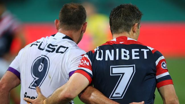 Cameron Smith and Cooper Cronk share a moment after Storm-Roosters preliminary final. Picture: Getty Images