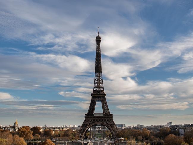 (FILES) This file photo taken on November 14, 2020 shows the Eiffel Tower in Paris. - Closed during the second lockdown, as part of measures against the Covid-19 epidemic, the Eiffel Tower announced on its official Twitter account on December 1, 2020 its reopening as of December 16. (Photo by Martin BUREAU / AFP)