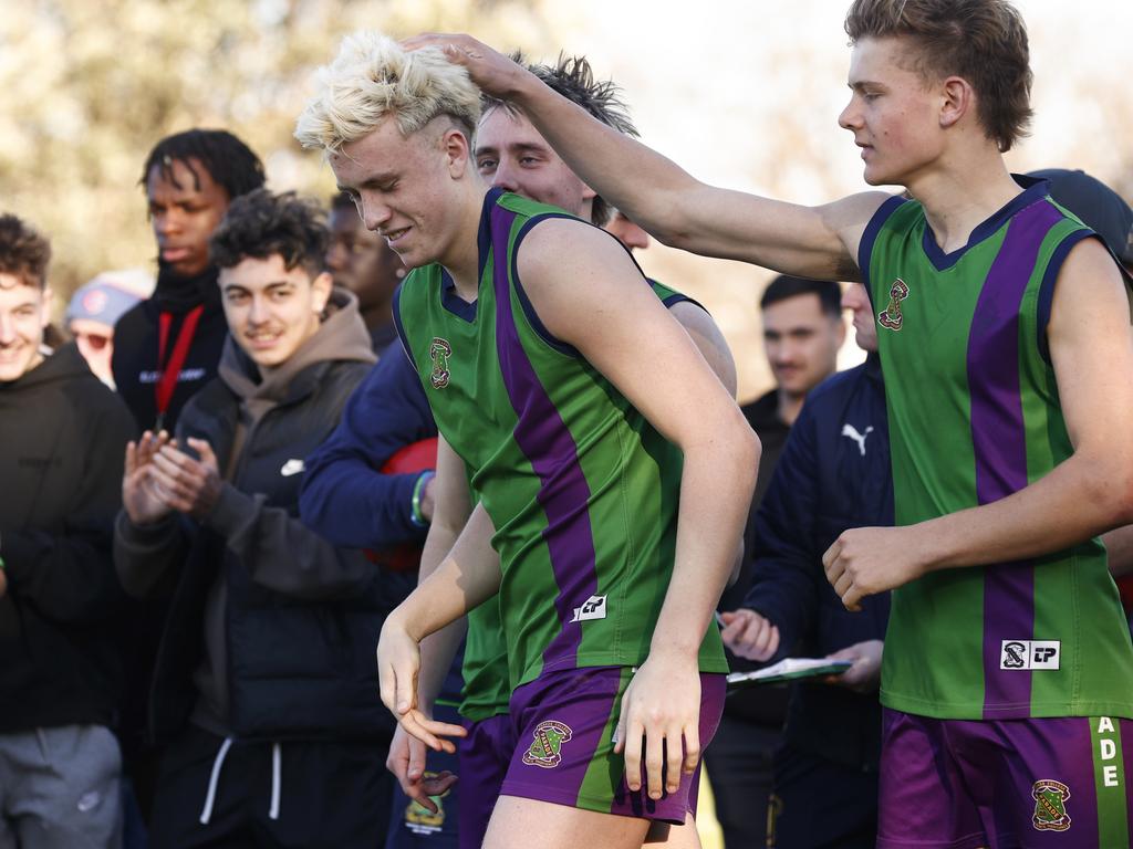 MELBOURNE, AUSTRALIA – AUGUST 09: Nate Caddy of Parade College (C) is awarded best on ground during the 2023 Herald Sun Shield: Division 1 Senior Boys Grand Final match between Parade College and Maribyrnong College at Trevor Barker Beach Oval on August 09, 2023 in Melbourne, Australia. (Photo by Daniel Pockett/AFL Photos/via Getty Images)