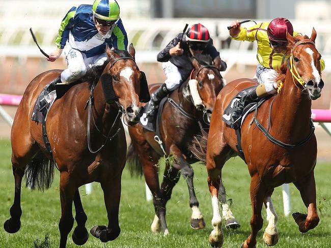 Mark Zahra rides Keen Array (left) to win the Gilgai Stakes in 2017.