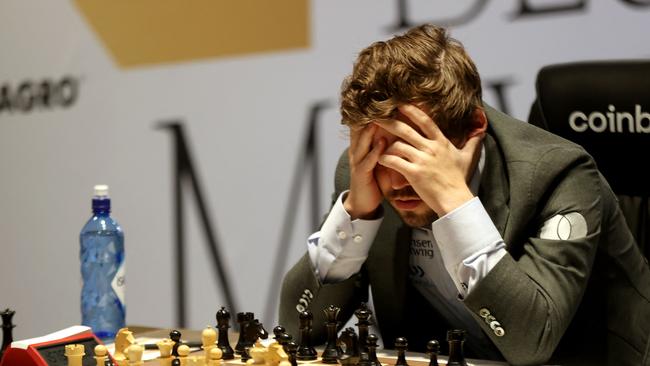 Norway's grandmaster Magnus Carlsen made a technological chess blunder for the ages when his mouse slipped during his game against longtime rival Hikaru Nakamura. Picture: AFP